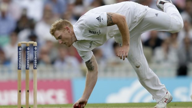 England's Ben Stokes fields a shot from Australia's David Warner on the first day of the fifth Ashes Test match between England and Australia, at the Oval cricket ground in London, Thursday, Aug. 20, 2015. (AP Photo/Tim Ireland)
