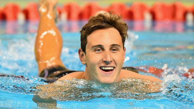 Fantastic form: Cameron McEvoy celebrates winning the 50-metre freestyle.