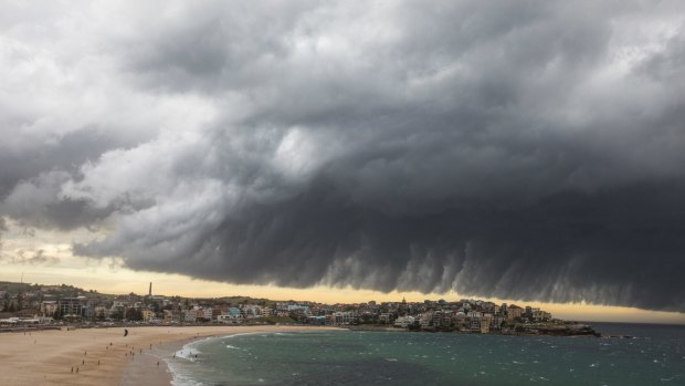 Swimmers left the water at Bondi Beach on Tuesday as the storm approached.