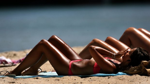 The beach was a popular place to be in Perth on Tuesday as the mercury reached 40 degrees.
