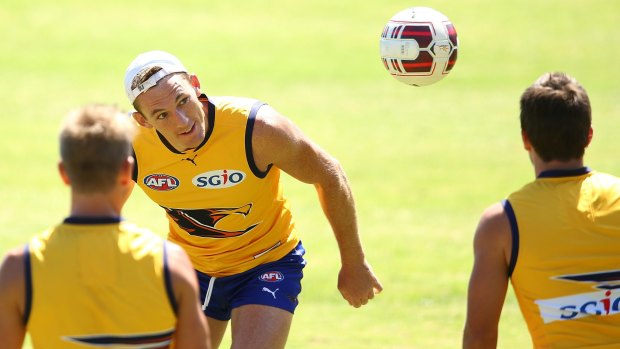 Former Roo Drew Petrie warms up with the Eagles at training.