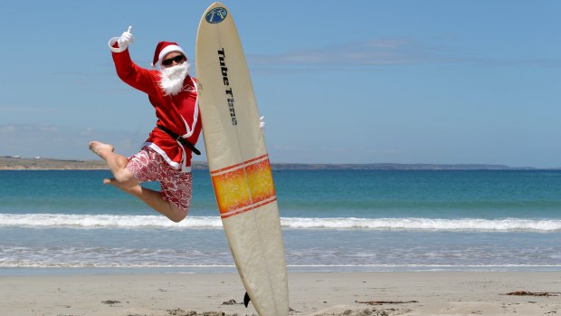 Sun-soaked Santa: Christmas in Australia could see you heading to the beach dressed as Santa. And why not? It will still be light at 3.30pm. 