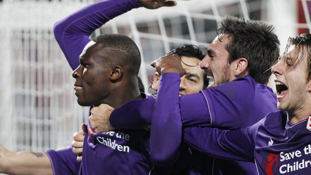 Fiorentina's Babacar, left, celebrates after scoring the winning goal.