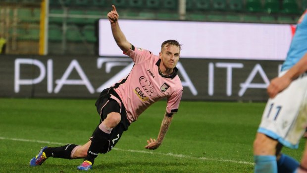 Palermo's Luca Rigoni celebrates his goal.