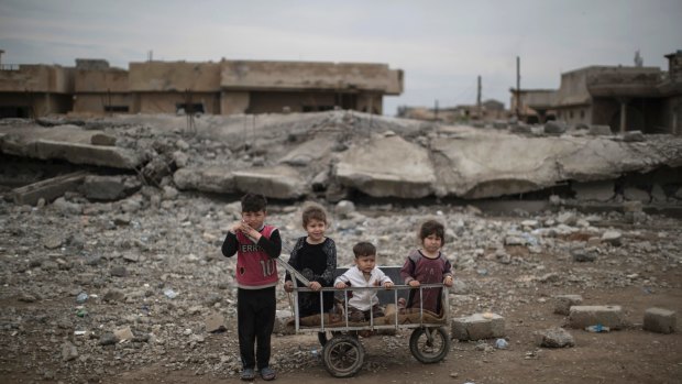 Children in the west of Mosul, Iraq, in late March.