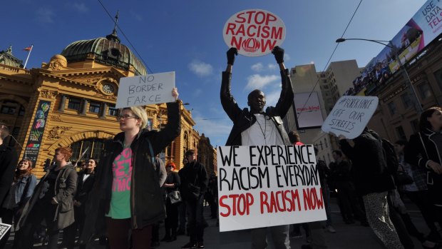Demonstrators stop traffic outside Flinders Street Station, protesting against Operation Fortitude on August 28.