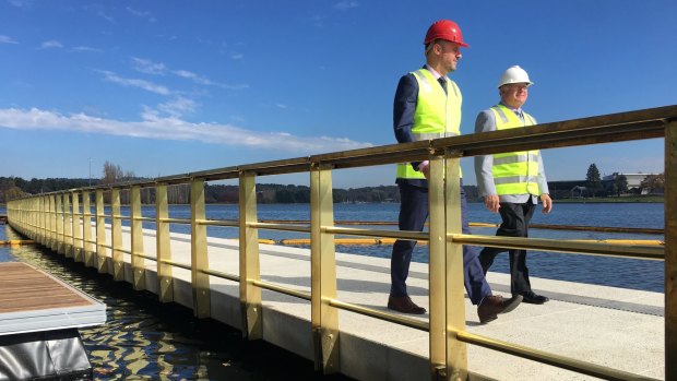 Andrew Barr and Mick Gentleman check out the first part of the West Basin boardwalk on Tuesday.