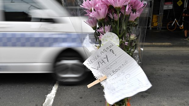 Flowers at the site on Flinders street where pedestrians were run down. 