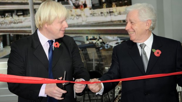 Frank Lowy cutting the ribbon at the opening of Westfield London with the then mayor of London, Boris Johnson.