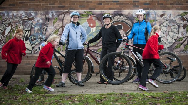 Cait Rawson of Hackett, Leonie Collis of Hackett and Nat Fairhurst of Ainslie will be taking part in the girls-only Ride the Divide. Also pictured are Matilda Milton, Megan Rawson and Kaylee Rawson.