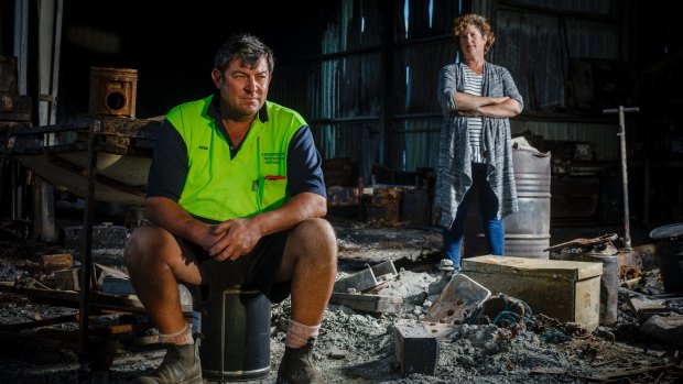 Vanessa and Kevin Lindley are still waiting to finalise insurance claims two months after a bushfire gutted their home in Carwoola. Structural engineers have advised that what is left of their work shed has to be pulled down. 