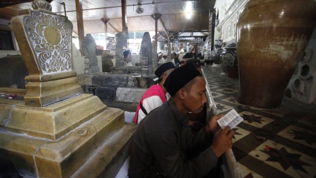 Worshippers pray at the shrines in the hope that the Wali Songo will intercede with God on their behalf.