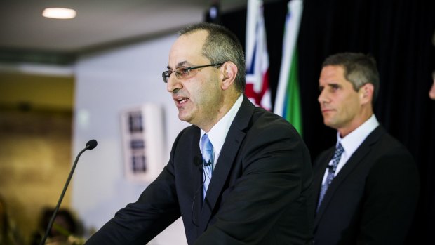 Double act: Immigration Department secretary Michael Pezzullo and Customs chief Roman Quaedvlieg outline plans to integrate their workforces.