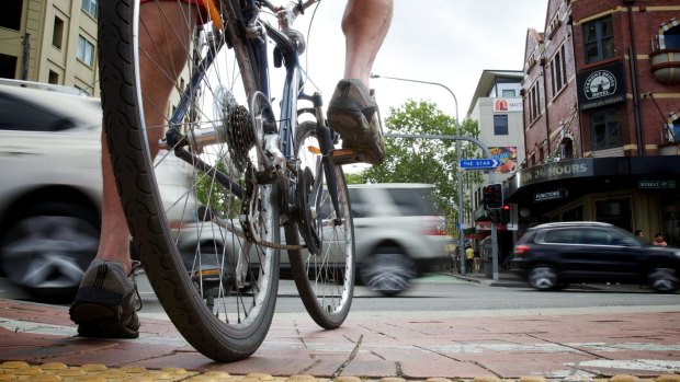 Bike riders in NSW may soon be legally required to carry photo identification. 
