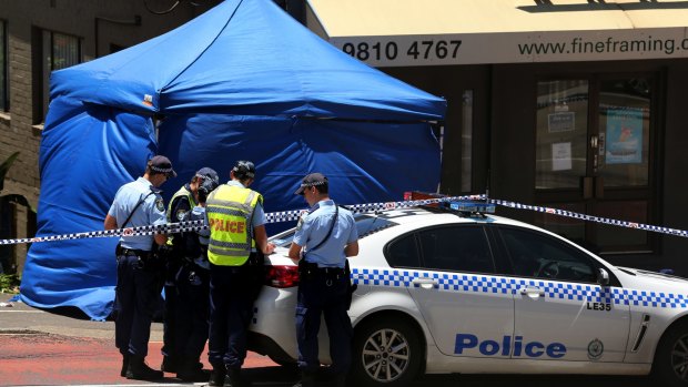A crime scene tent erected at the crash scene on Victoria Road in Rozelle on Sunday. 