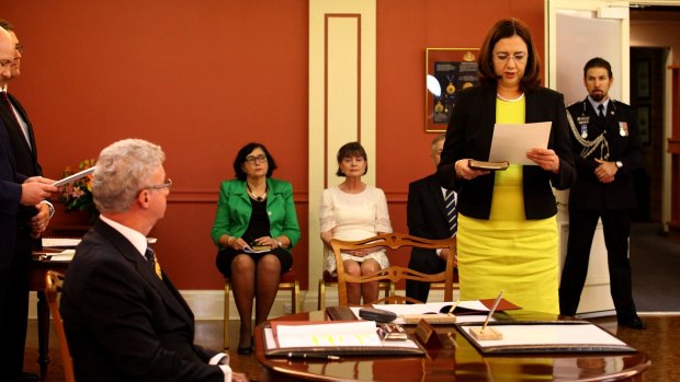 Annastacia Palaszczuk, being sworn in by Governor Paul de Jersey at Government House.
