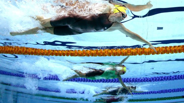 Underwater rivalry: Cate Campbell (top) in action in the final.