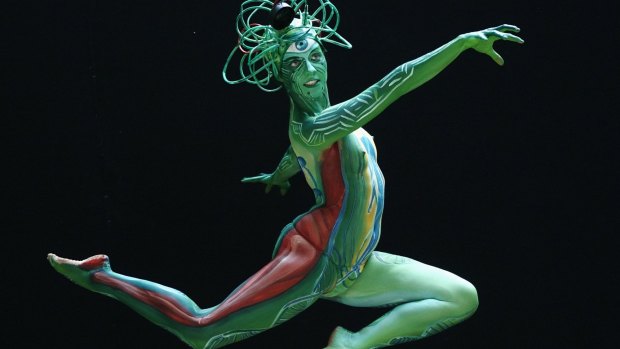 A model leaps at the annual World Bodypainting Festival in Poertschach.