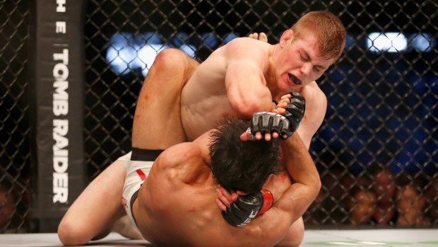 Jake Matthews on his way to defeating Akbarh Arreola at UFC 193 in Melbourne.