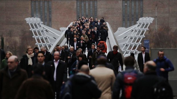 Crowded scenes at the Millennium Footbridge in London