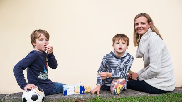 Micaela Hopkins and her two sons Tom, 6, and Josh, 8, who have a metabolic condition which means they can't process protein.