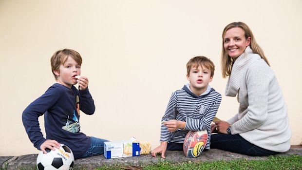 Micaela Hopkins and her two sons Tom, 6, and Josh, 8, who have a metabolic condition which means they can't process protein.