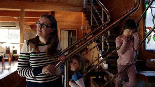 Emily Wheatley with daughters Ruth (left) and Olwen. Emily's husband Michael died suddenly while playing a game of beach volleyball. He collapsed and couldn't be resuscitated.