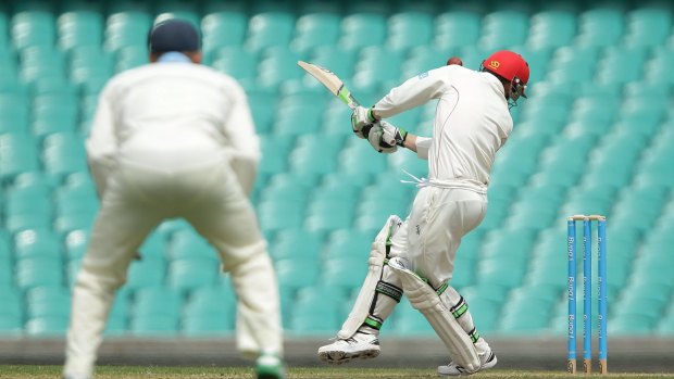 Phil Hughes is struck by Sean Abbott's bouncer at the SCG.