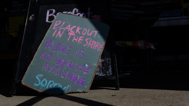 "Blackout in the shire": One restaurant posted this sign after wild winds cut power to thousands of homes and businesses.
