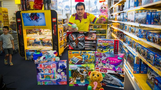 Toyworld Fyshwick managing director Geoff Morton with some of the hottest toys on Santa's list for Christmas 2017.
