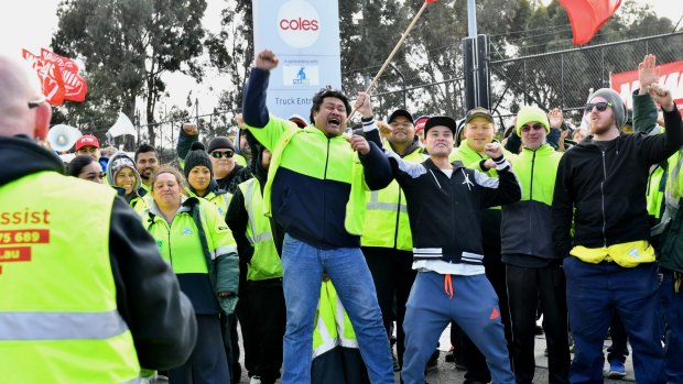 Workers picket a cold storage warehouse that supplies Coles.