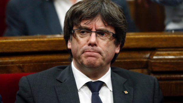 Catalonia's president Carles Puigdemont said it was up to the Catalan parliament to move forward with a mandate to break from Spain.