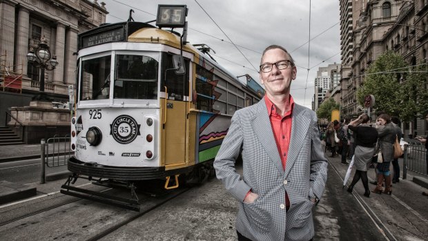 Artist Jon Campbell, seen in 2013 with one of his designs for an art tram.