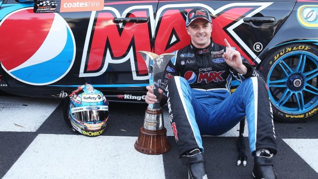 Mark Winterbottom driver of the #5 Pepsi Max Crew Ford poses with the V8 Supercar Championship Series Trophy after claiming his maiden V8 Supercar Championship Series title following race 36 for the Sydney 500, which is part of the V8 Supercar Championship Series.