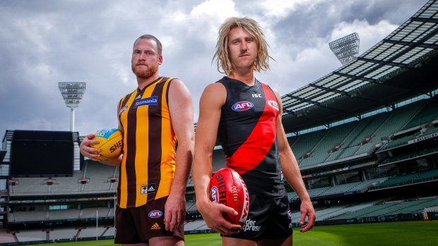 Hawthorn captain Jarryd Roughead (L) and Essendon captain Dyson Heppell ahead of their round 1 clash.