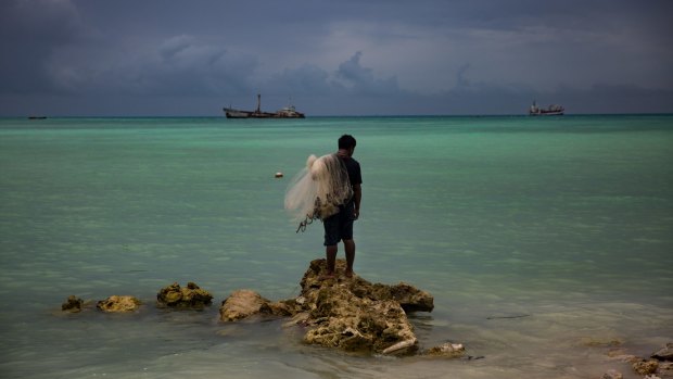 Kaitara Kautu, a net fisherman whose home flooded during a 2015 king tide in Betio, a town in Kiribati.