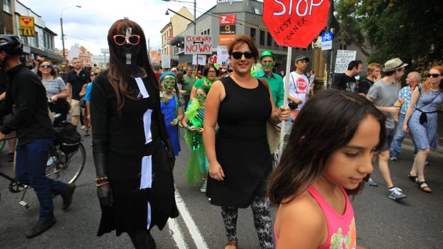 Some concerned  residents wore fancy dress as they took  the streets of Newtown, Sydney, on Sunday to protest the proposed development of the NSW government's WestConnex tunnel and road project.