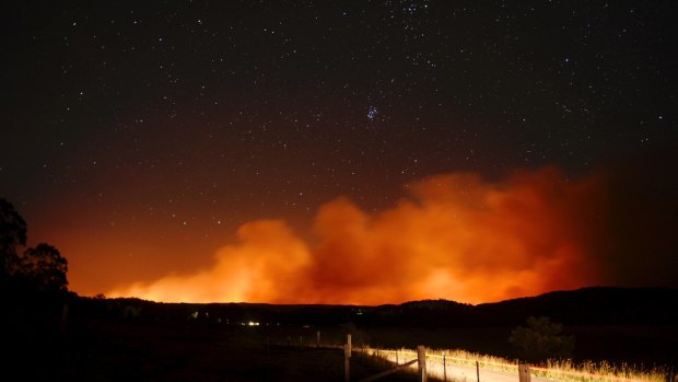 A massive bushfire near Putty was threatening properties on Wednesday.