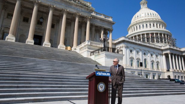 Senate Minority leader Harry Reid on the steps of the Capitol. 