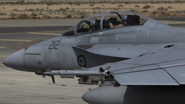 A Royal Australian Air Force F/A-18F Super Hornet taxis to begin another mission in the Middle East.