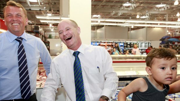 Scott Emerson and Campbell Newman with locals at Costco, North Lakes.
