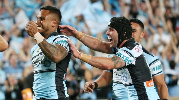 Fond memories: The Sharks celebrate Ben Barba's try during last year's grand final victory against the Storm.