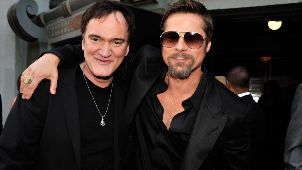 Director Quentin Tarantino and actor Brad Pitt arrive at the premiere of <i>Inglourious Basterds</i> in 2009.