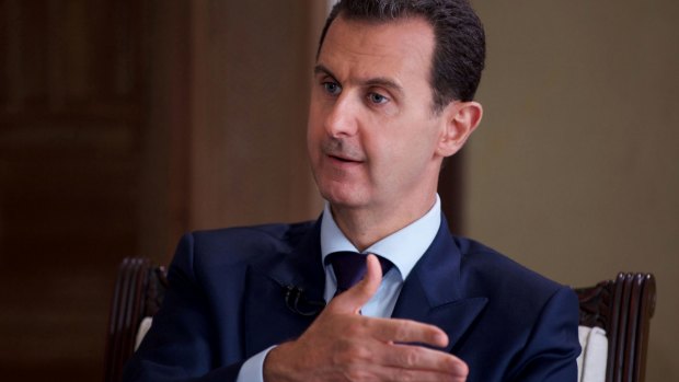 Syrian President Bashar Assad speaks during an interview with Australia's SBS news channel, in Damascus in July.