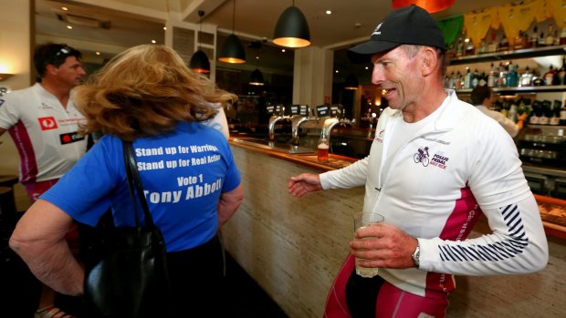 Ms Aiken wearing her "Vote 1 Tony Abbott" t-shirt.