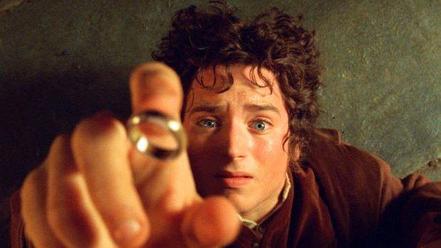 Elijah Wood's character Frodo reaches for the "One Ring", in the film <i>The Fellowship of the Ring</i>.