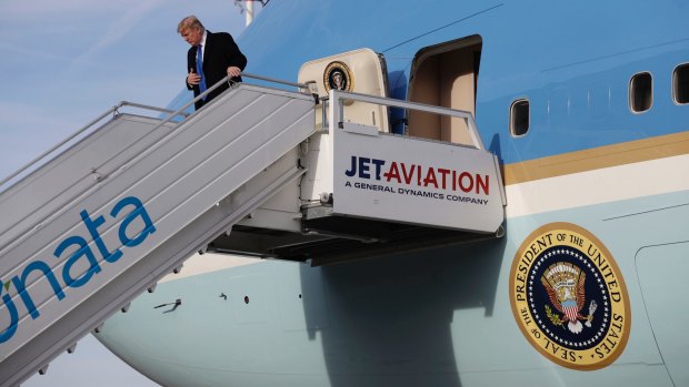 US President Donald Trump steps off Air Force One on arrival at Zurich International Airport for the Davos World Economic Forum.