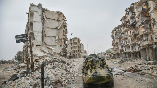 Palliate this? Russian troops in the devastated Syrian city of Aleppo. 