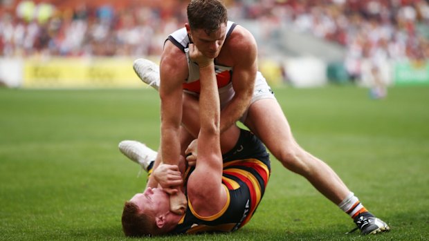 Close-fought: Tom Lynch of the Crows and Heath Shaw of the Giants get to grips.