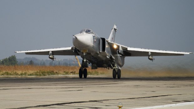 A Russian Su-24 takes off on a combat mission at Hemeimeem airbase in Syria. 